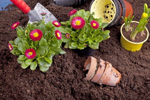 Gardeners Biggin Hill handling green waste recycling in a local garden