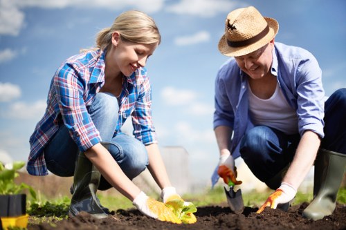 Gardeners working safely in a Biggin Hill garden