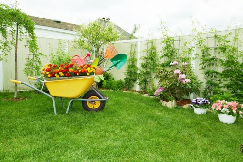 Landscape gardening in Biggin Hill with a neatly designed patio and planting beds
